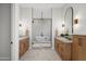 Modern bathroom showcasing a soaking tub, a glass shower, and dual vanities at 8501 E Appaloosa Trl, Scottsdale, AZ 85258