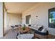 Inviting covered patio featuring comfortable seating, modern lighting, and stylish design at 8501 E Appaloosa Trl, Scottsdale, AZ 85258