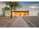 Charming single-story home with a well-maintained stone pathway at 8501 E Appaloosa Trl, Scottsdale, AZ 85258