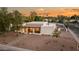 Lovely home with a covered patio and professionally landscaped front yard at 8501 E Appaloosa Trl, Scottsdale, AZ 85258