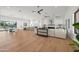 Spacious open-concept living area with a kitchen, dining area, living room, and seamless indoor-outdoor flow at 8501 E Appaloosa Trl, Scottsdale, AZ 85258