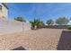 Wide shot of gravel-filled backyard area with block wall at 8737 E Nichols Ave, Mesa, AZ 85209
