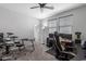 Study room with gaming setup, neutral walls, ceiling fan, and carpet at 8737 E Nichols Ave, Mesa, AZ 85209