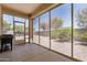 Enclosed sunroom with open windows and plenty of sunlight at 8737 E Nichols Ave, Mesa, AZ 85209