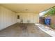 Carport with storage and access to backyard at 8741 W Osborn Rd, Phoenix, AZ 85037
