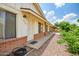 Charming home exterior with brick accents and well-maintained landscaping at 8741 W Osborn Rd, Phoenix, AZ 85037