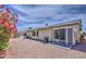 Backyard with gravel, desert plants, an outdoor grill, and a small patio at 964 Leisure World --, Mesa, AZ 85206