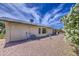 Backyard with gravel ground covering, desert flora, and a small patio at 964 Leisure World --, Mesa, AZ 85206