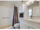 Bathroom featuring a single vanity and a shower with neutral-toned curtain at 964 Leisure World --, Mesa, AZ 85206