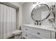 Bathroom featuring a modern vanity and a shower with stylish curtain at 964 Leisure World --, Mesa, AZ 85206