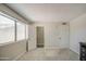 Bedroom with neutral walls, plush carpeting, and multiple storage options at 964 Leisure World --, Mesa, AZ 85206