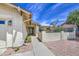 Inviting front entrance featuring a well-manicured yard, quaint walkway, and charming desert landscape at 964 Leisure World --, Mesa, AZ 85206