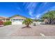 Charming single-story home featuring a well-manicured front yard with desert landscaping and a two-car garage at 964 Leisure World --, Mesa, AZ 85206
