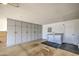 Large garage featuring ample cabinet space, laundry hookups, and plenty of room for storage at 964 Leisure World --, Mesa, AZ 85206
