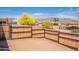 Expansive fenced backyard with low-maintenance desert landscaping, perfect for outdoor activities at 10177 E La Palma Ave, Gold Canyon, AZ 85118