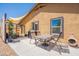 Spacious backyard with patio seating area, ideal for enjoying outdoor meals and gatherings at 10177 E La Palma Ave, Gold Canyon, AZ 85118