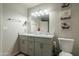 Bathroom features a dual sink vanity and toilet at 10177 E La Palma Ave, Gold Canyon, AZ 85118
