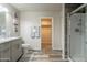 Bathroom featuring a single sink vanity, shower and toilet, with a closet for storage at 10177 E La Palma Ave, Gold Canyon, AZ 85118
