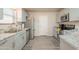 Modern kitchen features stainless steel appliances and bright countertops at 10177 E La Palma Ave, Gold Canyon, AZ 85118