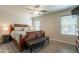 Main bedroom boasts a ceiling fan, wood accents and hardwood floors at 10177 E La Palma Ave, Gold Canyon, AZ 85118