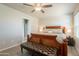 Spacious main bedroom features hardwood floors and ceiling fan at 10177 E La Palma Ave, Gold Canyon, AZ 85118
