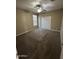 Comfortable bedroom featuring carpet, closet, and window at 10736 W Swayback Pass, Peoria, AZ 85383