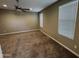 Comfortable bedroom featuring soft carpeting, recessed lighting, and ample natural light at 10736 W Swayback Pass, Peoria, AZ 85383