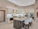 Modern kitchen with stainless steel appliances, a large island, and custom cabinetry at 10907 E Bella Vista Dr, Scottsdale, AZ 85259