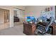 Spacious office area with desk, and natural light streaming in at 10907 E Bella Vista Dr, Scottsdale, AZ 85259
