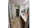 Bathroom featuring double sinks, vanity and mirror, and a shower at 11460 W Eden Mckenzie Dr, Surprise, AZ 85378