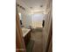 Standard bathroom featuring a tub with shower, wood vanity and white toilet at 11460 W Eden Mckenzie Dr, Surprise, AZ 85378