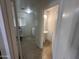 Small bathroom and laundry room at 11460 W Eden Mckenzie Dr, Surprise, AZ 85378