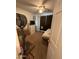 Bedroom featuring a ceiling fan, carpeted floor and bright lighting at 11460 W Eden Mckenzie Dr, Surprise, AZ 85378