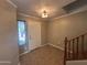 Entry way featuring a window and tile flooring, leading to the rest of the home at 11460 W Eden Mckenzie Dr, Surprise, AZ 85378