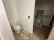 Toilet room with a toilet and the entrance to a walk-in closet at 11460 W Eden Mckenzie Dr, Surprise, AZ 85378