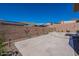A well-manicured backyard features desert-style landscaping and provides a serene and private outdoor space at 14141 E Highland Ave, Fountain Hills, AZ 85268