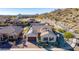 This elevated aerial view showcases the desert landscaping of this charming property at 14552 S 182Nd Dr, Goodyear, AZ 85338