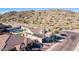 This aerial view showcases the desert surroundings of this charming single Gathering home at 14552 S 182Nd Dr, Goodyear, AZ 85338