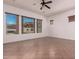 Bedroom featuring large windows with scenic mountain views at 14552 S 182Nd Dr, Goodyear, AZ 85338