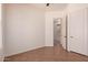 Bright bedroom featuring a ceiling fan and a door leading to another room at 14552 S 182Nd Dr, Goodyear, AZ 85338