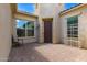 Charming front entrance featuring a solid wood door and sidelight windows at 14552 S 182Nd Dr, Goodyear, AZ 85338