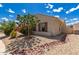 Landscaped yard featuring desert vegetation and a well-maintained exterior at 14552 S 182Nd Dr, Goodyear, AZ 85338