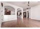 Bright open-concept layout with views into the kitchen and living areas, complete with tiled floors at 14552 S 182Nd Dr, Goodyear, AZ 85338