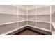 Walk-in pantry with abundant shelving for organized storage at 14552 S 182Nd Dr, Goodyear, AZ 85338