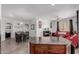 Open concept living, dining and kitchen area perfect for entertaining Gathering and friends in one space at 14575 W Mountain View Blvd # 11220, Surprise, AZ 85374