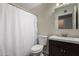 Bathroom featuring vanity, mirror and toilet with shower and curtain at 15407 N 2Nd St, Phoenix, AZ 85022