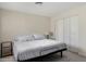 Clean bedroom features a comfortable bed, and ample storage with closet at 15407 N 2Nd St, Phoenix, AZ 85022