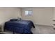 Bedroom featuring a double bed and a large window at 15407 N 2Nd St, Phoenix, AZ 85022