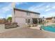 Expansive backyard featuring a hot tub, in-ground pool, and a patio, perfect for entertaining at 17819 N 46Th Dr, Glendale, AZ 85308