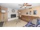 Cozy living room with a white brick fireplace and comfortable furnishings at 17819 N 46Th Dr, Glendale, AZ 85308